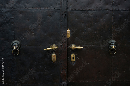 Old iron front door © DoraZett