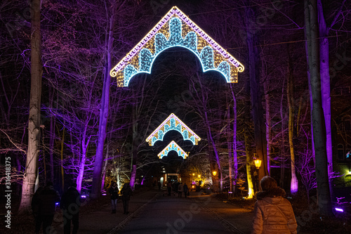 Photography Neon lighting decorations in shape of ornate arches in Christmas Garden Berlin