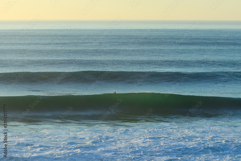 Big beautful perfect surfing waves barreling in the Atlantic Ocean. Surf Spot.