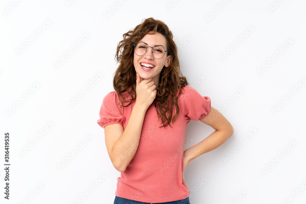 Young pretty woman over isolated background with glasses and smiling Young pretty woman over isolated background with glasses and smiling