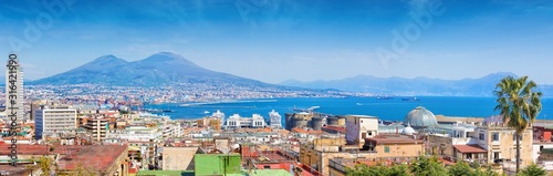 Panoramic view of Naples, Italy. Castel Nuovo and Galleria Umberto I towering over roofs of neighboring houses of Naples.