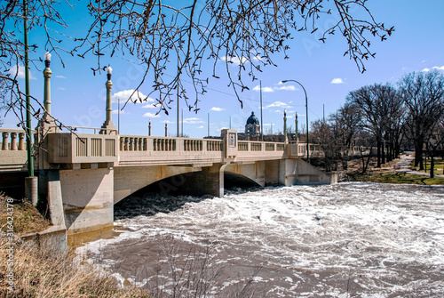 Spring flood of Wascana creek under the Albert Memorial Bridge (Regina, Saskatchewan)