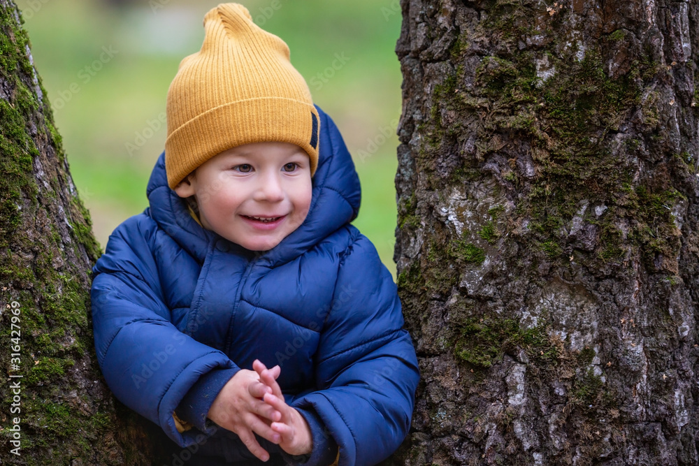 Portrait of a child outdoors. Happy little boy Portrait of a child outdoors. Happy little boy