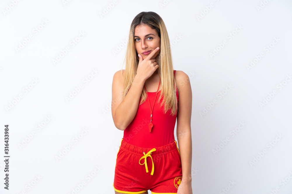 Lifeguard woman over isolated white background thinking an idea Lifeguard woman over isolated white background thinking an idea