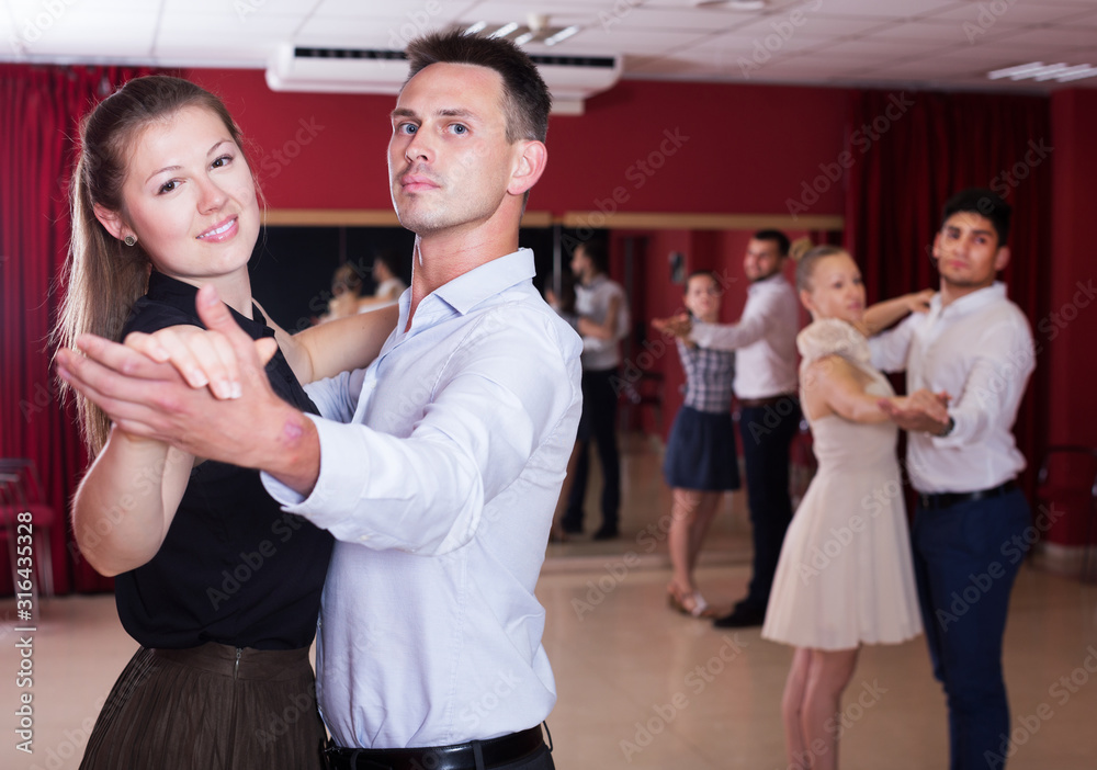 People dancing together slow ballroom dances