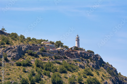 Lighthouse on the hill at Port de Soller in Majorca. Spain © vivoo