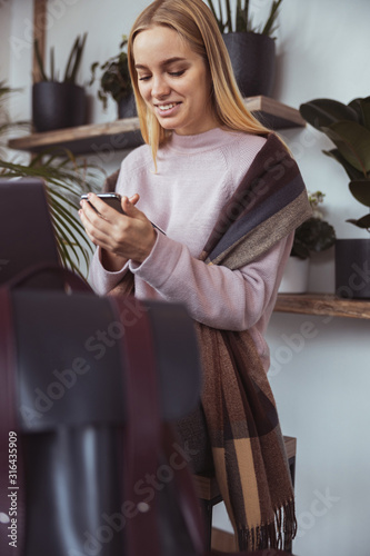 Young cheerful lady outdoors and indoors