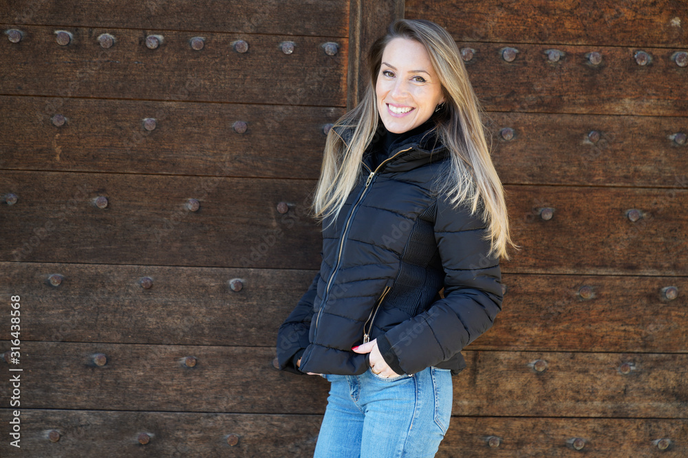 Smiling girl with winter beautiful jacket Smiling girl with winter beautiful jacket