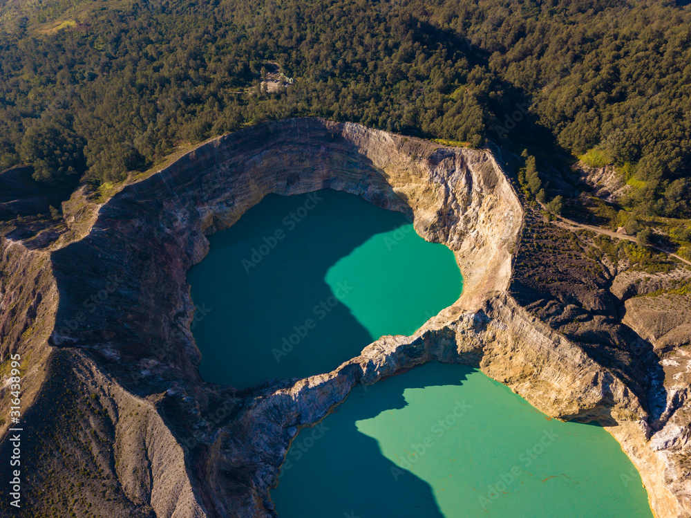 Beautiful morning aerial top view of Kelimutu Crater Lakes, Moni, Flores, Indonesia. Travel photo from drone.