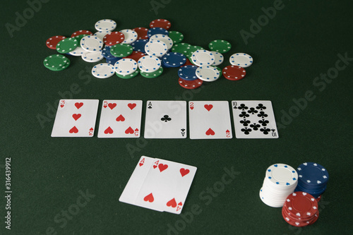 Playing Texas Holdem winnig with a Straight Heart Flush A 2 3 4 5 photo