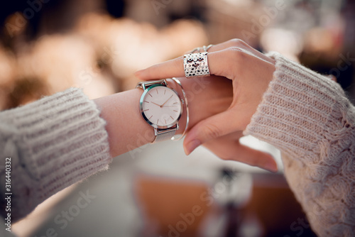 Stylish fashion watch on woman hand