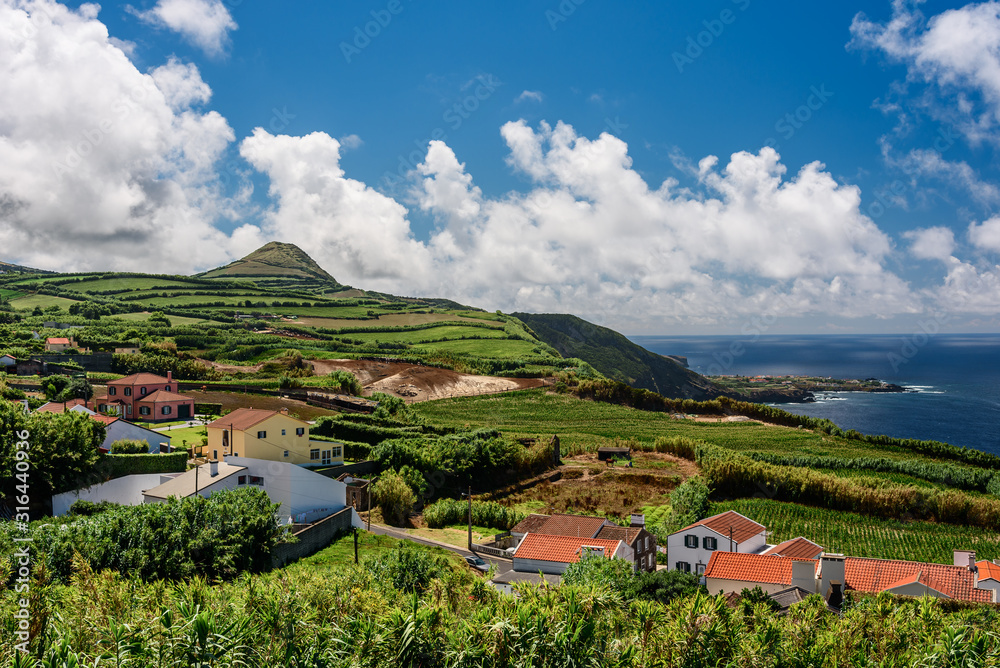 panorama of the countryside and cliff over the sea in azores islands. portugal