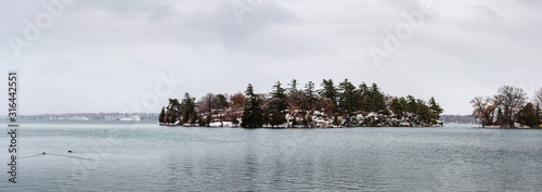 Panorama of two winter Islands on a snowy day.