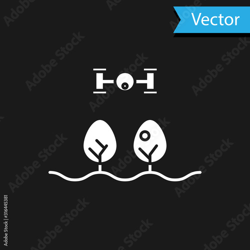 White Smart farm with drone control and tree icon isolated on black background. Innovation technology for agricultural company. Vector Illustration