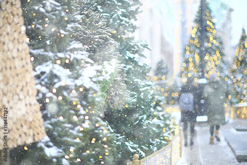 Fototapeta premium Christmas decoration in Moscow, Christmas trees on the street, snowy December, season new year