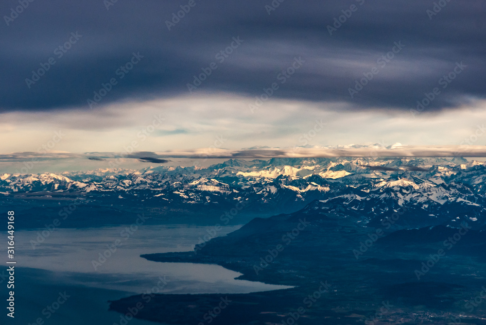 Aerial view of the Swiss Alps across lake Geneva