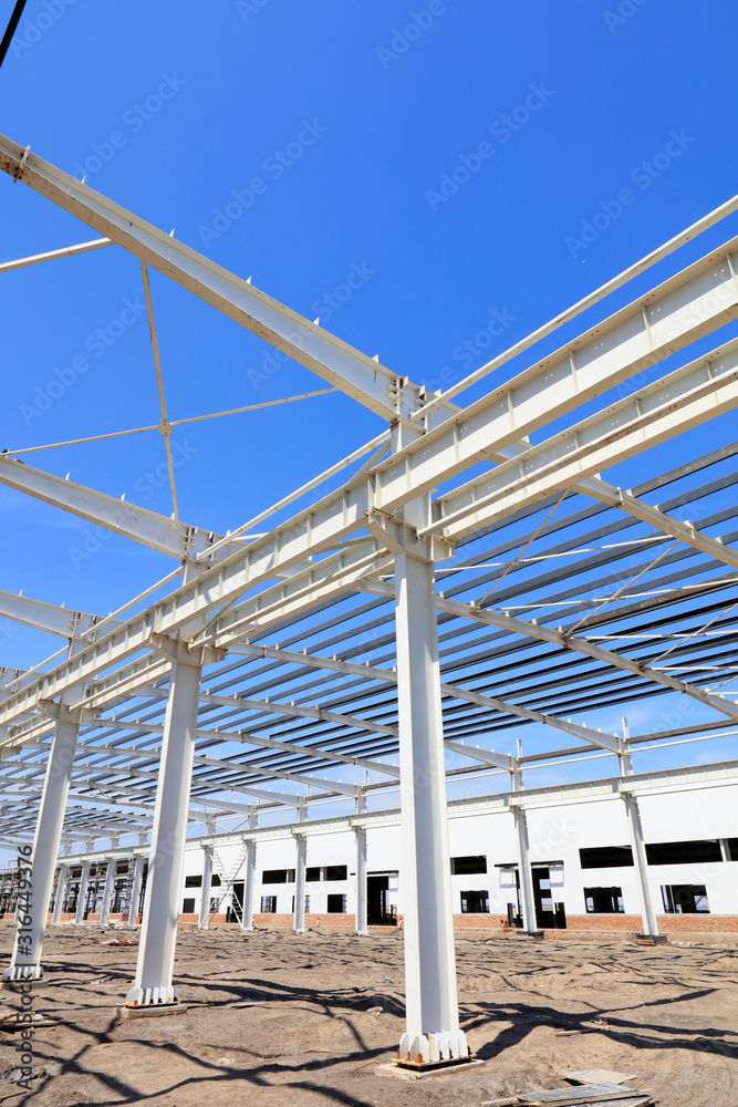 steel girder truss under blue sky steel girder truss under blue sky