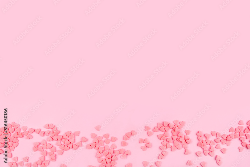 Pink background with tiny hearts. Valentine's day concept. Top view. Pink background with tiny hearts. Valentine's day concept. Top view.