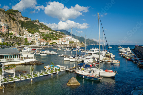 Amalfi harbor with lots of different type boats and town view. Italy. © AlexanderNikiforov