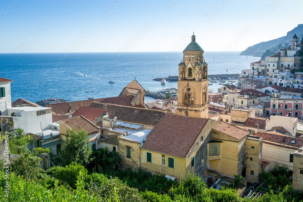 Amalfi old town historic district and cathedral tower. Italy landmarks.