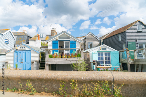 Small holiday home line the waterfront at Whitstable.