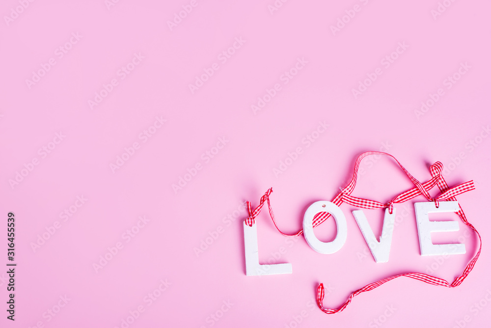 love on a pink background.Flat lay , view from above. Place for the inscription. love on a pink background.Flat lay , view from above. Place for the inscription.