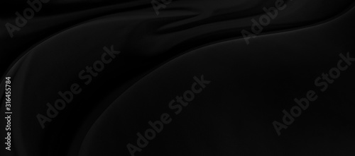 Black gray satin dark panorama fabric texture luxurious shiny that is abstract silk cloth background with patterns soft waves blur beautiful.