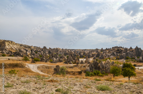 Fairy Chimneys with beautiful old rock formations in Cappadocia, Goreme, Turkey