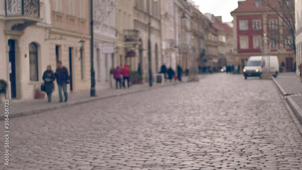 Unrecognizable people in the european city. Unrecognizable people in the european city.