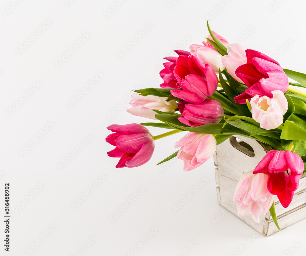 Tulips in a white box