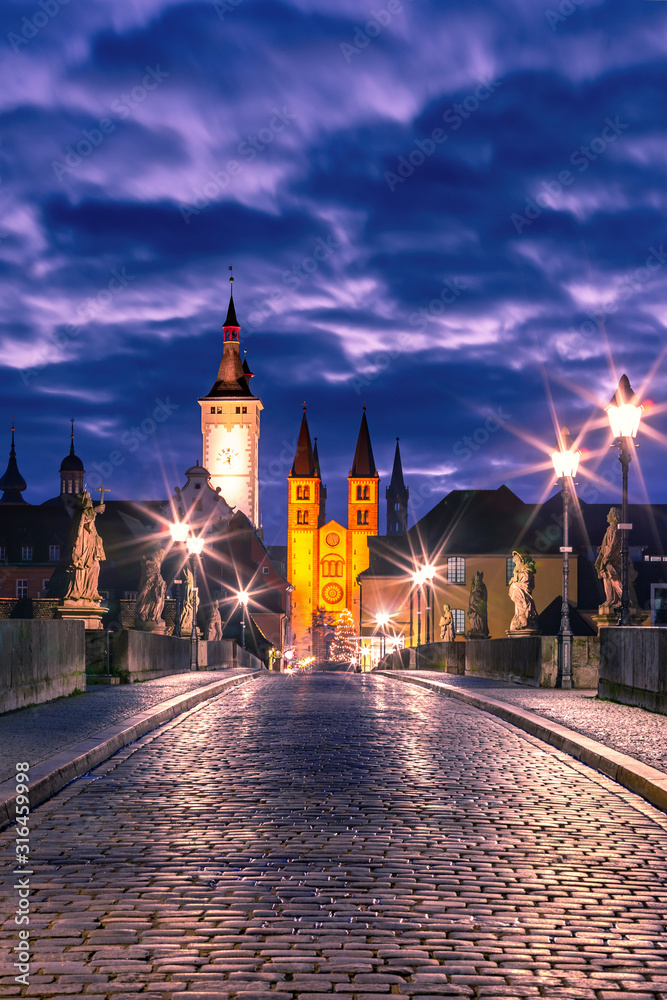 Old Main Bridge, Alte Mainbrucke with statues of saints, Cathedral and City Hall in Old Town of Wurzburg, Franconia, Bavaria, Germany