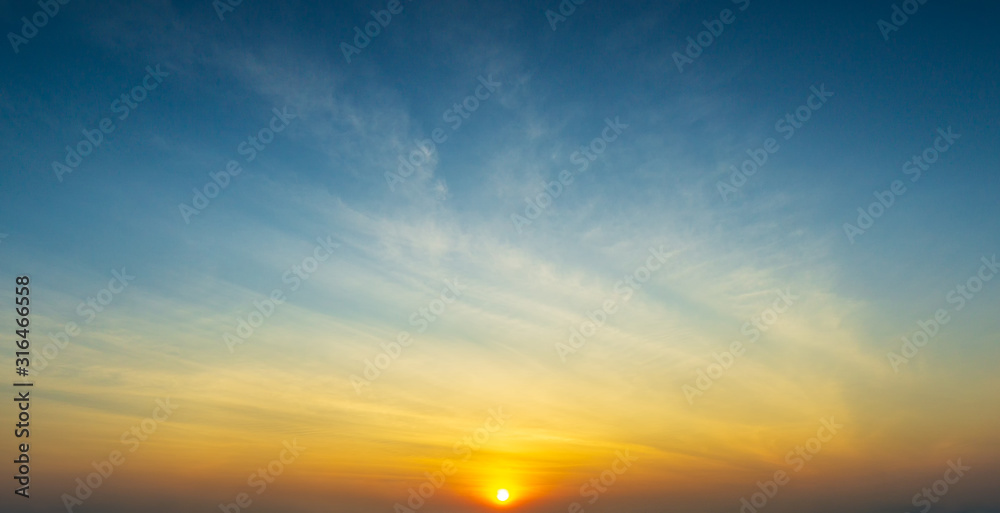the sun and sky with clouds golden hour time nature background
