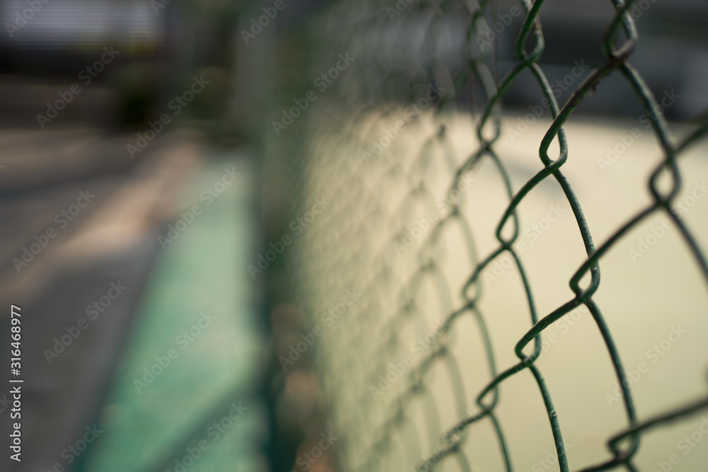 Grill fence at outdoor sport court Grill fence at outdoor sport court
