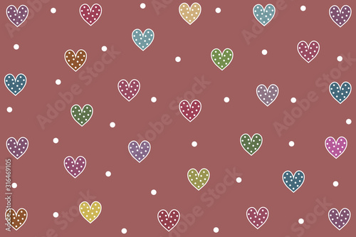 Colorful hearts with white dots on pink background.
