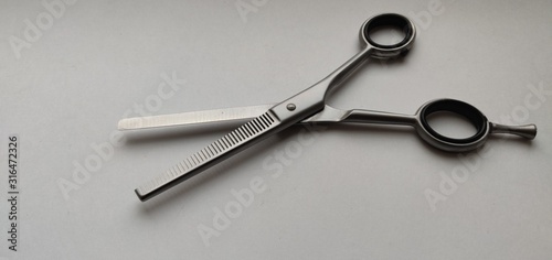 barber thinning scissors on a white background