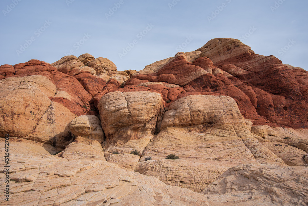 Landscape of tall white and red rock formations at Red Rock Canyon Conservation Area in Las Vegas, Nevada