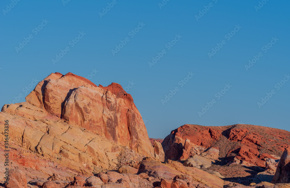 Low angle landscape of large colorful rock formations at Valley of Fire State Park in Nevada