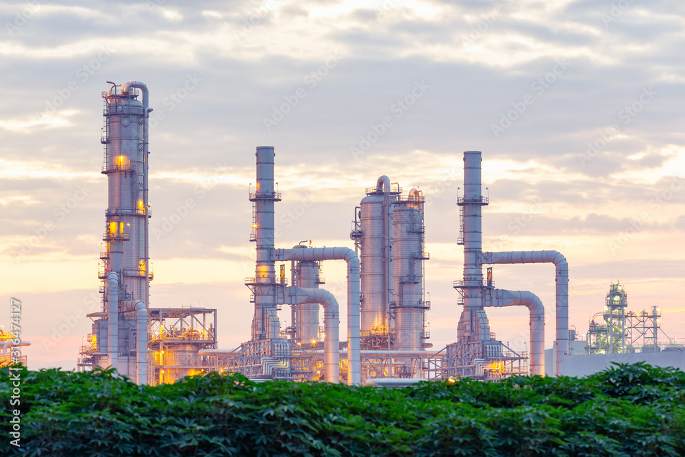 Obraz premium Oil gas refinery plant. May called petroleum, production or petrochemical plant. Industrial factory construction from engineering technology with steel pipe, pipeline, tank. Business for power energy.