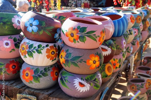 Beautiful colorful Mexican pottery on display © Michael