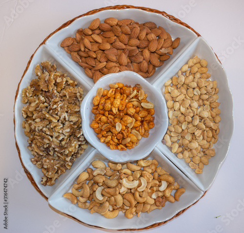 Mixed nuts in a snack tray for a party photo