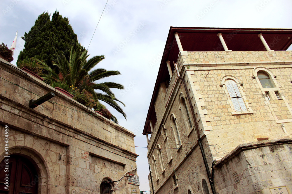 Roofs of houses on a narrow street of the old city in the center of Jerusalem. Israel. Street - Via Dolorosa.