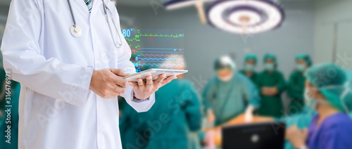 Medical technology the doctor held a tablet check the patient in the hospital