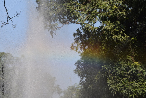 Rainbow between the fountain, Pinjore Garden, Haryana photo