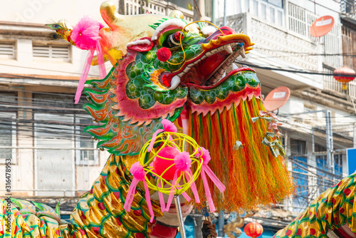 The ball and Chinese golden dragon dance for Chinese new year celebrations. 