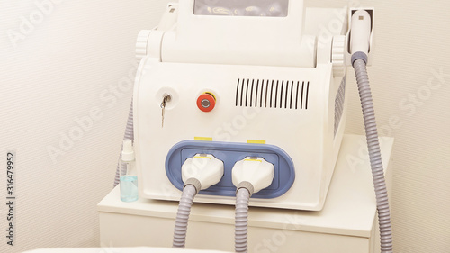 Laser elos medical device. Remove unwanted hair and asteriks. Cosmetology spa procedure at salon. Depilation equipment
