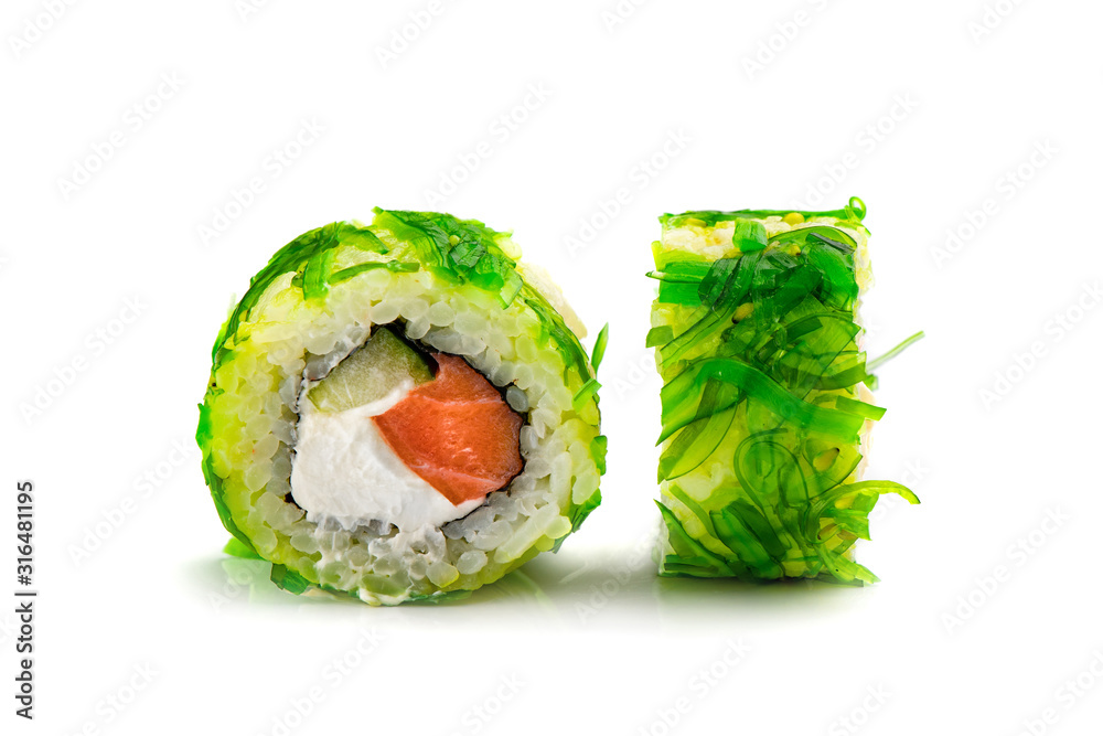 Traditional fresh japanese sushi rolls on a white isolated background. Traditional fresh japanese sushi rolls on a white isolated background.