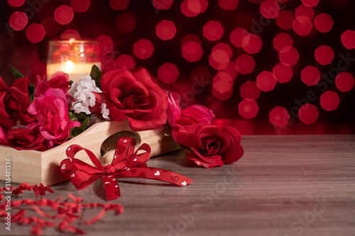 Red Roses and Red Hearts Ribbon Bow with Candle on Table