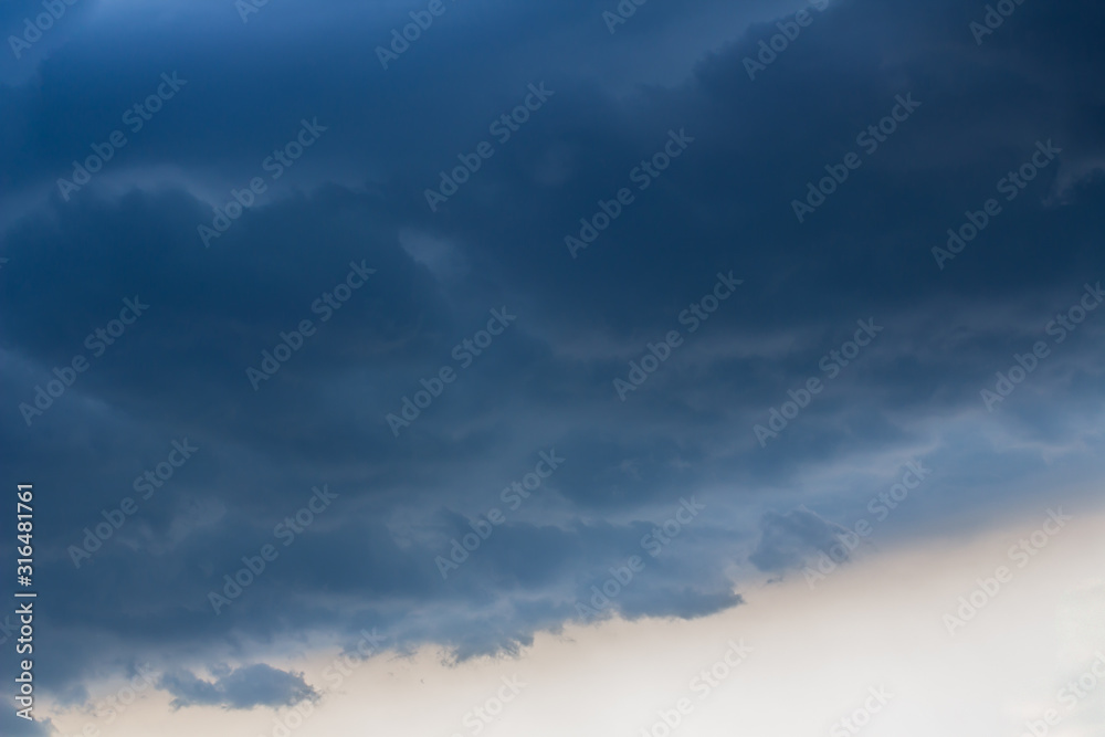 Bright and dark cloud on beautiful blue sky,Fluffy clouds formations