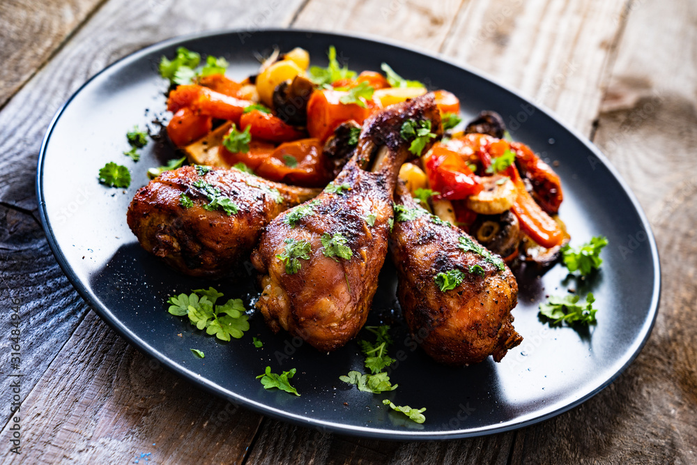 Barbecue chicken drumsticks with roast vegetables