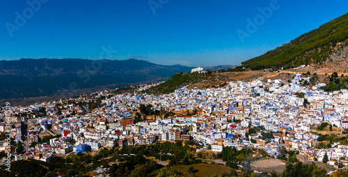 Aerial view of white and blue medina of Chefchaouen, Morocco  © zenobillis